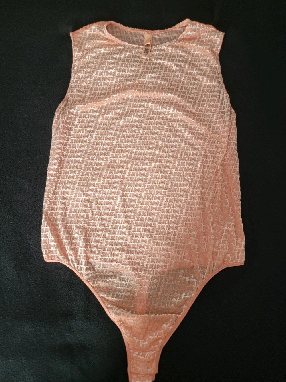 Skims Sleeveless One-Piece Bodysuit in Peach